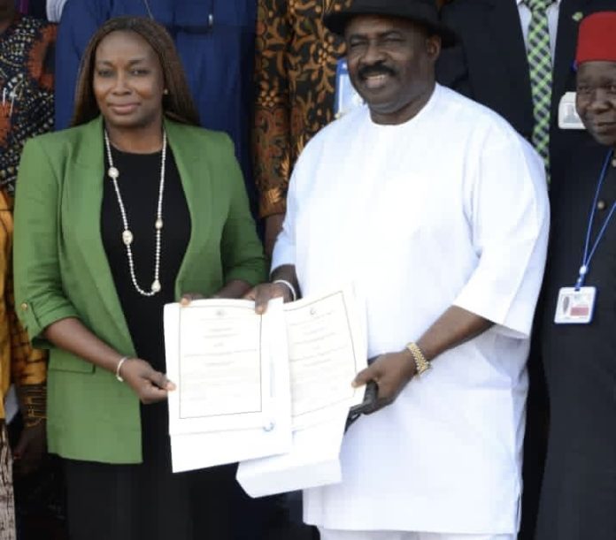 Director General of the Nigerian Civil Aviation Authority, NCAA, Captain Chris Najomo (right) presenting the certificates to the Managing Director of the Federal Airports Authority of Nigeria, FAAN, Mrs Olubunmi Kuku (left) at the NCAA headquarters in Abuja recently.