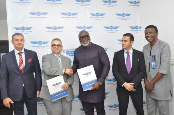 L-R: Commercial Director, IGVA Solar Energy Limited, Nikita Pavlenko; Chief Executive Officer, Marathon Airlines, Andreas Kaiafas; Chairman\CEO United Nigeria Airlines (UNA), Prof Obiora Okonkwo; Chief Executive Officer, Recom Technologies, Hamlet Tunyan and Chief Commercial Officer United Nig Airlines; Raphael Uchegbu during the Signing of Memorandum of Understanding on Maintenance, Repair and Overhaul Partnership, Interline and Codeshare Agreement between Cronos Aviation and United Nigeria in Lagos on Friday.