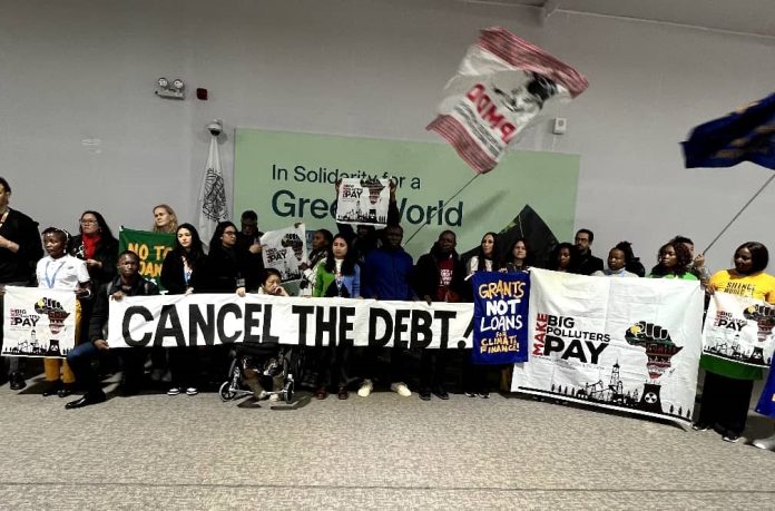 protest against climate debt.
