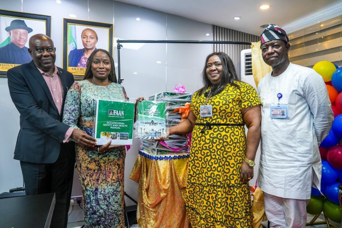 L-R: General Manager, Safety, Mr John Okezie Ekpe, Managing Director, Chief Executive, FAAN, Mrs Olubunmi Kuku, DGM, Safety Promotion, FAAN, Mrs Mba Ifeoma Loretta and AGM, Safety, Oguche Samuel Enejo at the marking of Mrs Kuku's one year in office and launch of the Occupational Safety and Health Manual and Aerodrome General Safety Handbook at FAAN Headquarters in Lagos on Wednesday.