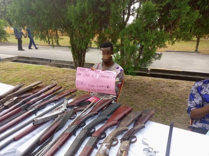Suspect and Items recovered from the gun factory in Akwa Ibom.
