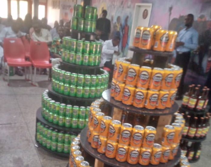 pic of the canned brands of Champion lager beer and Champ Malta