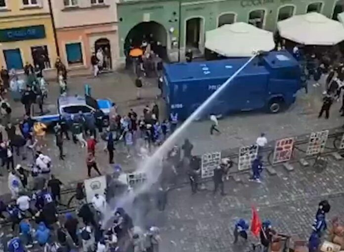 Water Cannons After Chelsea, Betis Fans Clash In Wroclaw Water Cannons After Chelsea, Betis Fans Clash In Wroclaw