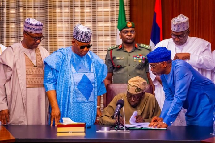 Tinubu signs
