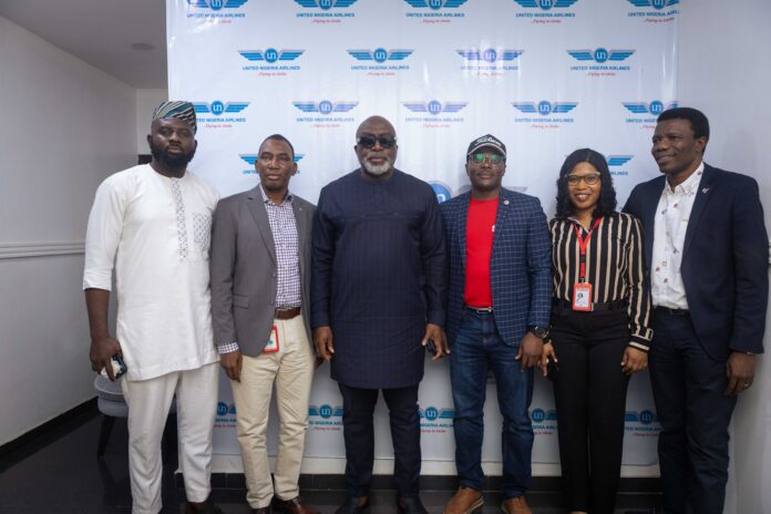 Chairman of United Nigeria Airlines, Prof Obiora Okonkwo (4th right), Vice President, Sabre Travel Central and West Africa, Dr Dare Olayiwola (3rd right) and other guests at the unveiling of the GDS in Lagos on Friday.