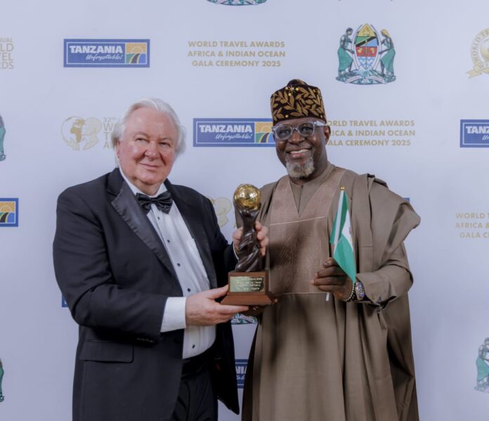 Group Managing Director of Finchglow Holdings, Mr Bankole Bernard (right), receiving the award during the Africa & Indian Ocean Gala Ceremony held in Dar es Salaam, Tanzania, recently. Group Managing Director of Finchglow Holdings, Mr Bankole Bernard (right), receiving the award during the Africa & Indian Ocean Gala Ceremony held in Dar es Salaam, Tanzania, recently.
