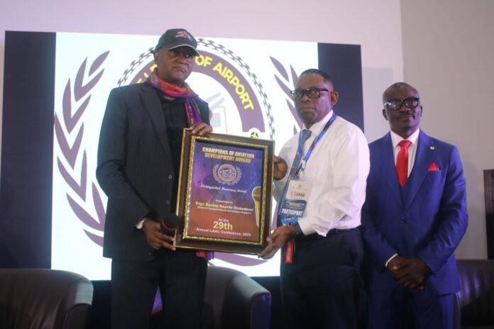 Founder of Akwaaba African travel market, Amb. Ikechi Uko (left) presents the award to the awardee's son and representative, Capt. David Olubadewo (middle), while the Chairman of the League of Airport and Aviation Correspondents (LAAC), Mr Idris Suleiman (right) look on, during the 29th edition of LAAC's Annual Conference held in Lagos on 7th August, 2025. Founder of Akwaaba African travel market, Amb. Ikechi Uko (left) presents the award to the awardee's son and representative, Capt. David Olubadewo (middle), while the Chairman of the League of Airport and Aviation Correspondents (LAAC), Mr Idris Suleiman (right) look on, during the 29th edition of LAAC's Annual Conference held in Lagos on 7th August, 2025.