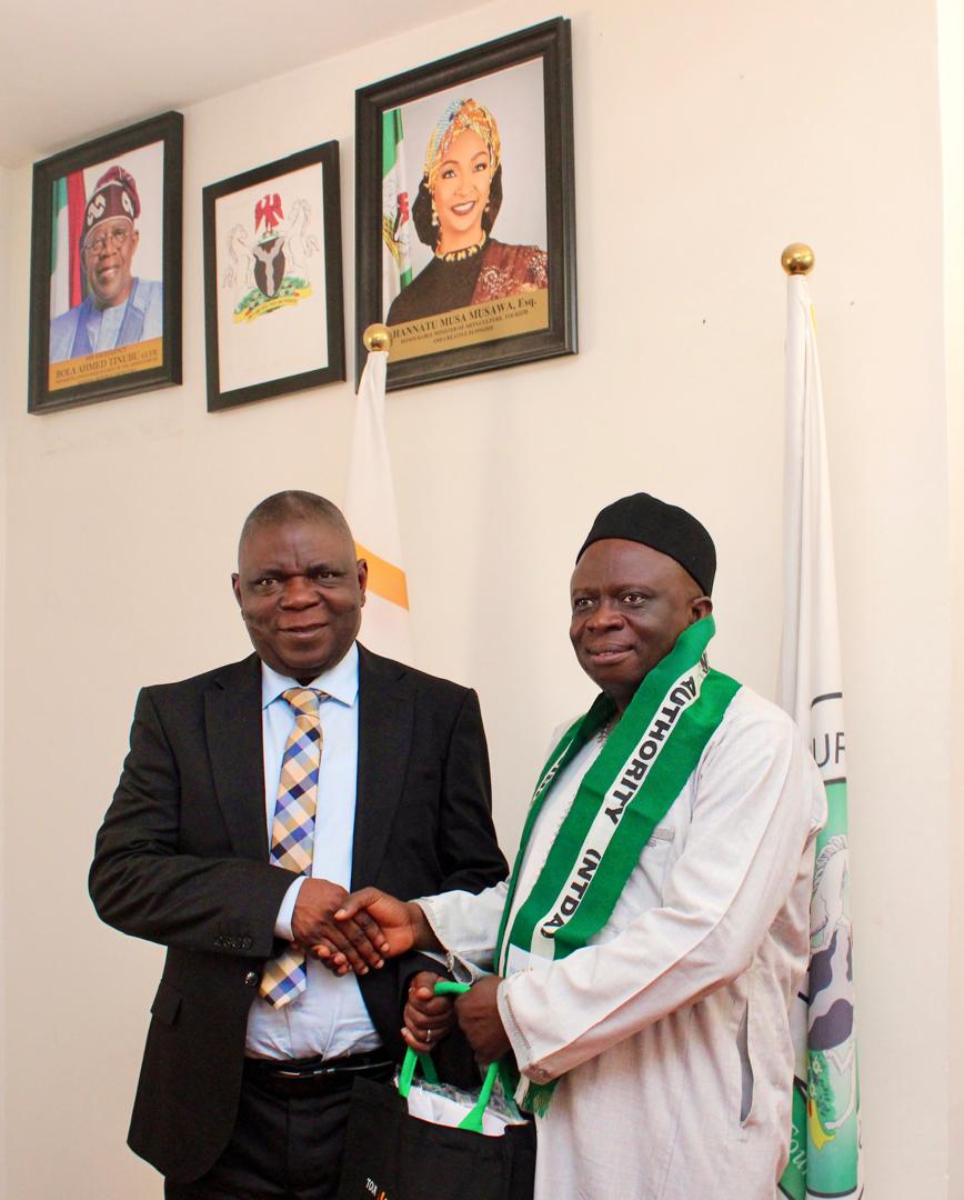 Director overseeing Office of the Director General, Nigerian Tourism Development Authority (NTDA), Mr Ovie Richard Esewhaye and the President, Federation of Tourism Associations of Nigeria (FTAN) after the latter was decorated as a Tourism Ambassador during the courtesy visit at the NTDA headquarters, Abuja - THEWILL NEWS MEDIA Director overseeing Office of the Director General, Nigerian Tourism Development Authority (NTDA), Mr Ovie Richard Esewhaye and the President, Federation of Tourism Associations of Nigeria (FTAN) after the latter was decorated as a Tourism Ambassador during the courtesy visit at the NTDA headquarters, Abuja
