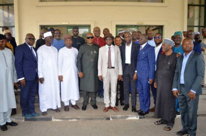 Middle RMAFC Chairman, Dr. Mohammed Bello Shehu OFR, Coordinating Director FIRS Mr. Shettima Tamadi, Secretary to the Commission, Nwaze Joseph Okechukwu, other officials from RMAFC, FIRS and the engaged consultants in a