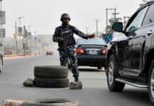 THEWILL EDITORIAL: Law Enforcement Agents as Extortionists, Armed Robbers police-checkpoint - Tinted Glass Permit