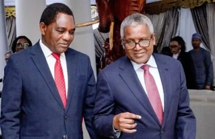 Aliko Dangote and Mr Hakainde Hichilema Aliko Dangote and Mr Hakainde Hichilema
