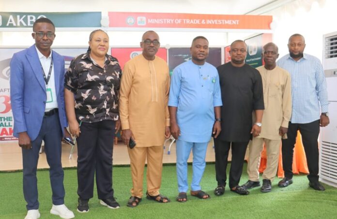 Stakeholders at the ministry of trade and investment stand at the Government pavillion Stakeholders at the ministry of trade and investment stand at the Government pavillion.