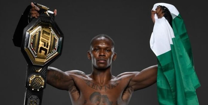Adesanya With Belt and Nigerian Flag Israel Adesanya