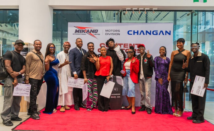 Chibundu Victor Chisom (middle), the overall winner and other participants at the Mikano Changan Creators Challenge held in Mikano Motors showroom in Victoria Island, Lagos, on Thursday.