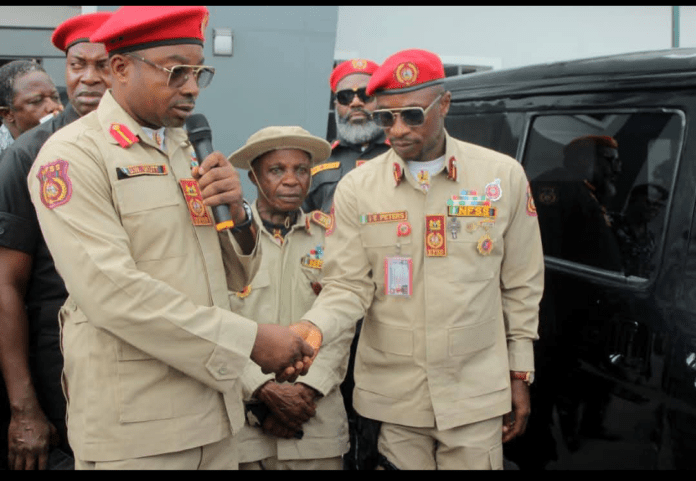 The Chairman of Itu LGA, Hon. Ubong Nkutt handing the vehicle keys to the NFSS, South-South Zonal Commander, Ime Peters, at Mbak Atai yesterday