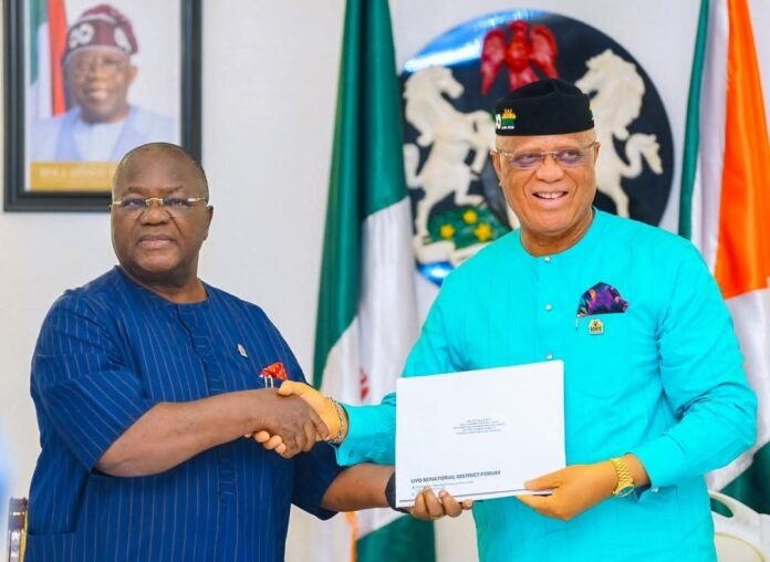 Governor of Akwa Ibom State, Pastor Umo Eno, while receiving the endorsement communiqué from the political leader of Uyo Senatorial District, Senator Effiong Bob, yesterday. Governor of Akwa Ibom State, Pastor Umo Eno, while receiving the endorsement communiqué from the political leader of Uyo Senatorial District, Senator Effiong Bob, yesterday.