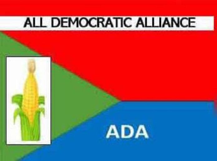 Logo for All Democratic Alliance (ADA) featuring a corn stalk emblem on a tri-color green, red, and blue background underlined with the party name.