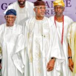 Traditional Rulers Key Partners In Governance, Grassroots Development — Tinubu Five people in white and gold Nigerian agbada outfits posing at a cultural event; woman on left in a patterned dress and headwrap.