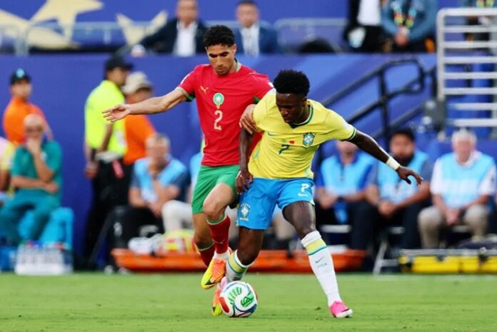 Brazil's Vinícius Júnior and Morocco defender Achraf Hakimi Brazil's Vinícius Júnior and Morocco defender Achraf Hakimi