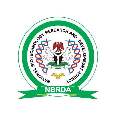 IMG_3959 Circular seal of Nigeria's National Biotechnology Research and Development Agency (NBRDA) with a green border and a green ribbon reading NBRDA.