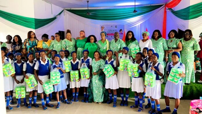 wife of Itu LGA Chairman, Mrs Idongesit Ubong Nkutt, with school girls who benefited from Sanitary pads and hygiene materials during the World Menstrual Day Celebration at Mbak Atai, Monday. wife of Itu LGA Chairman, Mrs Idongesit Ubong Nkutt, with school girls who benefited from Sanitary pads and hygiene materials during the World Menstrual Day Celebration at Mbak Atai, Monday.