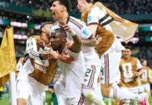 Mexico Destroy Czechia with a Clinical Second-Half Surge Group of soccer players in white uniforms celebrate a goal on the field, arms raised and shouting.