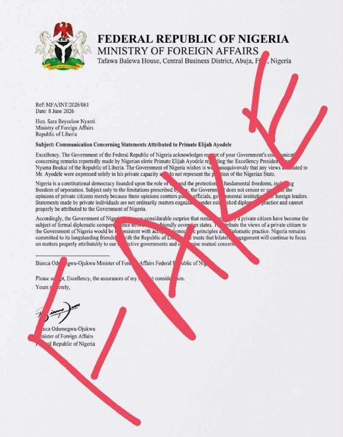 Official Nigerian government letter on MFA letterhead with a red 'FAKE' watermark across the page.