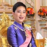 Thailand’s Princess Bajrakitiyabha Dies at 47 After Nearly Four Years in Coma Woman in a royal purple dress with sash and ornate jewelry seated on a gilded throne.