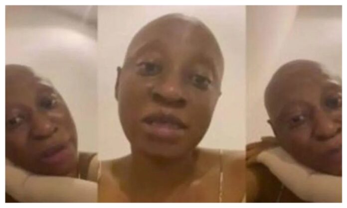 Cynthia-Anijekwu Triptych selfie of a bald person making different facial expressions, wearing a light-colored top and scarf-like wrap against a plain background.