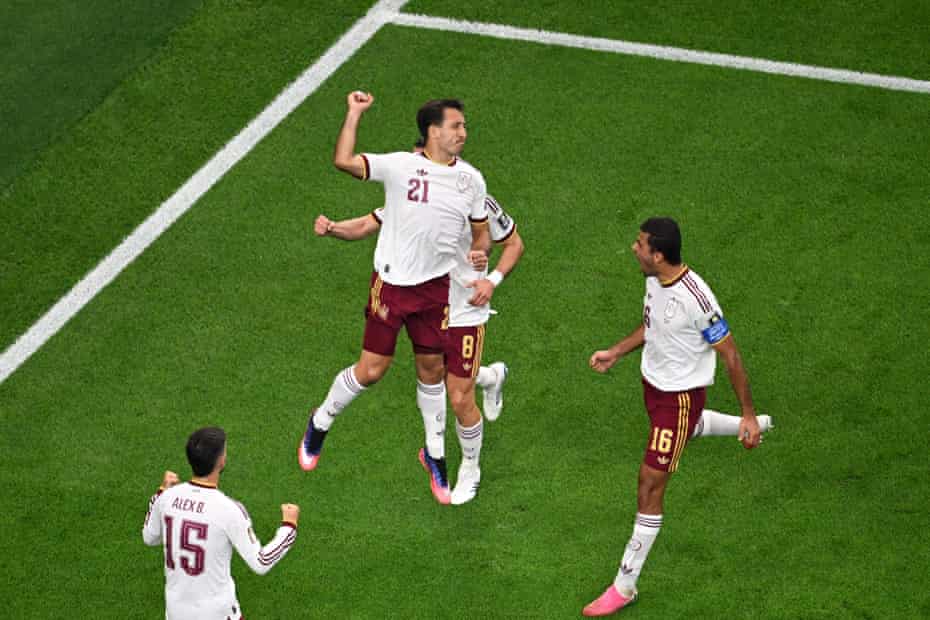 Mikel Oyarzabal - THEWILL NEWS MEDIA Soccer players in white and maroon celebrate a goal on a green field, jumping and cheering; jersey numbers 21 and 8 visible.