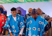 Ogun 2027: Abiodun Presents Adeola To Ijebu Royal Fathers, Seeks Support For APC Ticket Ahead Of Election Group of men in blue traditional outfits at a formal ceremony, some wearing hats and standing behind a table.