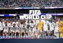 England Turn Third-Place Playoff into World Cup Blockbuster Against France England football team pose with medals on a podium after winning bronze at the FIFA World Cup 2026, with fans in the stadium behind.