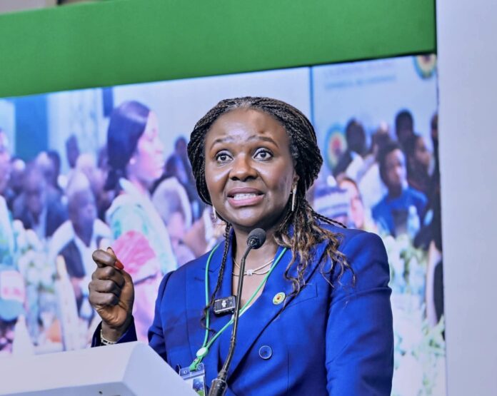 NUPRC Commission Chief Executive, Oritsemeyiwa Eyesan, addresses stakeholders during the 2025 Commercial Bid Conference in Abuja, where she announced the outcome of Nigeria's 2025 Oil Licensing Round, with 31 companies emerging successful in securing 37 oil and gas blocks while 13 unbid blocks were returned to the national licensing pool, reinforcing the transparency and merit-driven principles of the Petroleum Industry Act (PIA)