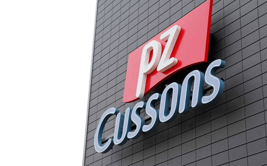 PZ - THEWILL NEWS MEDIA PZ Cussons logo on a dark tiled exterior wall of a building