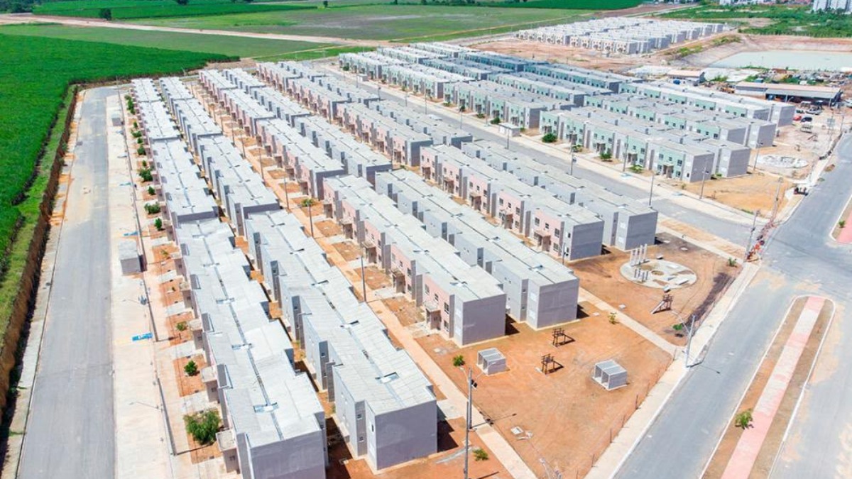 Blocks of flat under construction, China Hyway logo - THEWILL NEWS MEDIA Rabe Darma, Minister of Housing and Urban Development, China Hyway logo