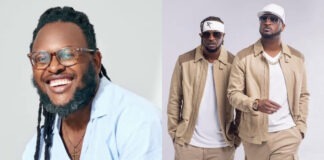 Clarence Peters’ Resurfaced Interview Sparks Fresh Debate Over P-Square’s Wealth Amid Financial Dispute Smiling man with glasses and dreadlocks in a light blue shirt photographed in a portrait.