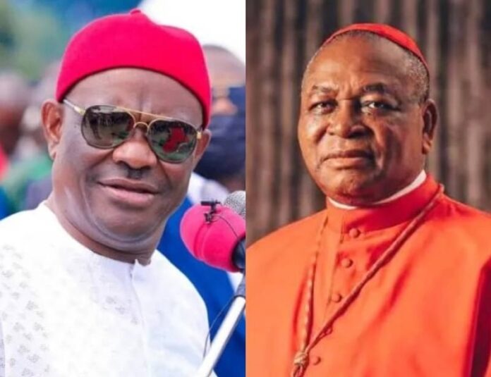 FCT Minister Nyesom Wike (left) and Archbishop Emeritus of the Catholic Archdiocese of Abuja, Cardinal John Onaiyekan. Wike challenged Onaiyekan’s neutrality, alleging that the Catholic cleric’s position during the 2023 presidential election was known to Nigerians.