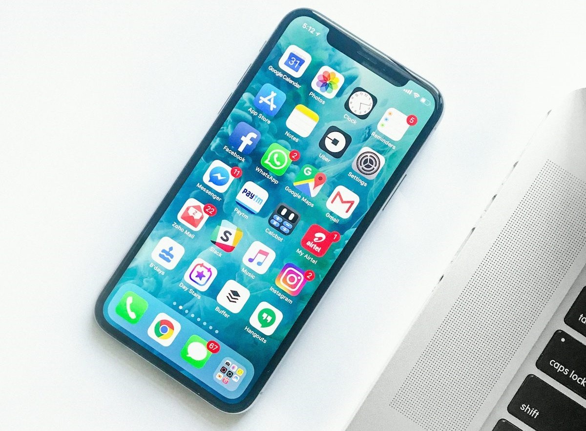 smartphone displaying third-party consumer and business applications - THEWILL NEWS MEDIA smartphone displaying third-party consumer and business applications